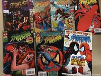 Front covers of seven The Spectacular Spider-Man comic books with vibrant artwork and various characters.