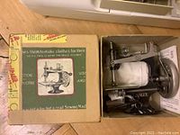 Metal Singer Creative Touch Fashion Machine 1030 sewing machine inside its original box