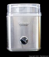 Front view of the Cuisinart ICE-30BC frozen yogurt and ice cream maker showing brushed stainless steel finish and dial control on front.