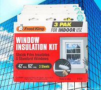 Close-up photo of one Frost King window insulation kit box showing product name, shrink film size (42" x 62"), and packaging details.
