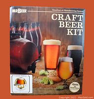 Front view of Mr. Beer Craft Beer Kit box showing brand, product name, serving size, and flavor profile with images of beer glasses and keg.