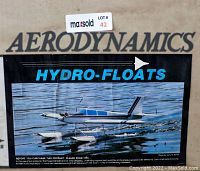 Box with logo and product label showing a model aircraft equipped with the Hydro-Floats on water.