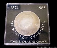 Front side of the coin showing Sir Winston Churchill's profile and commemorative text in a display case.
