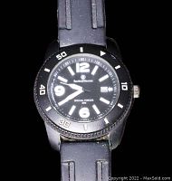 Front view of black Smith & Wesson Paratrooper watch dial showing the time, date window, white numerals and hands, with rotating bezel and black rubber strap.