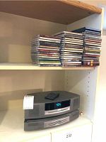 Main and changer units on shelf below CD stack