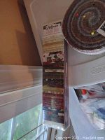 Hoffman Jingle Pop Christmas-themed fabric bundle in packaging.