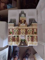 County Courthouse building in original styrofoam packaging showing detailed front with clock tower and wreaths.