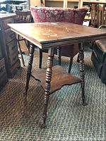 Full view of the solid wood square fern table showing the top surface, turned legs, and surroundings.