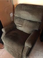 Frontal view showing backrest, seat and armrests