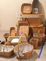 Multiple baskets arranged on floor showing entire lot