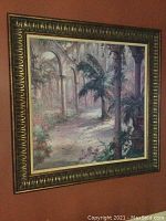 Framed garden pathway wall art with ornate bronze and gold frame