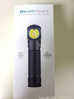 Box front showing Olight Perun 2 flashlight with key features such as 166 meters throw and 2500 lumen output.