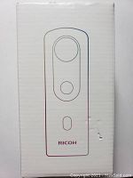 Front of product box showing outline illustration and Ricoh branding