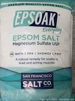 Front labeled view of Epsoak Epsom Salt bag noting brand and product details.