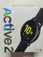 Retail packaging box for Galaxy Watch Active2 showing model name and 44mm size