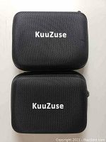 Two black KuuZuse branded zippered hard cases stacked