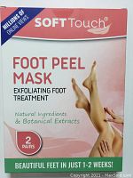 Front view of one box showing product name, purpose, and key features including 2 pairs per pack and natural ingredients.