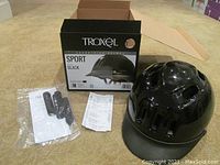 Box, Troxel black equestrian helmet, packaging contents unboxed