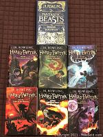 Photo showing all 6 Harry Potter paperback books and Fantastic Beasts hardcover screenplay together.