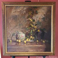 Front view of framed oil painting depicting still life with a porcelain vase, earthenware pot, and yellow fruit branch on wooden table