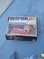 Closed box of Actron Inductive Diagnostic Analyzer Model 628 showing box graphics and branding.