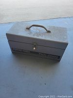 Gray metal case with handle and latch, labeled 'Porter Cable Plate Joiner' on the front.