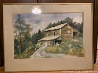 Front view of the framed watercolor painting showing the entire artwork and frame