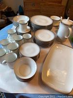 Overview of full china set arranged on table