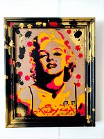 Full frontal view of framed painting showing portrait, frame and paint splatter accents