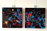 Front view of the diptych, both panels showing vibrant abstract spray paint artwork on wood canvas.