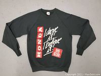 Full front view of the black vintage Honda 1990 sweatshirt sized Large with text and logo graphics.