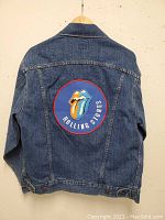 Full back view showing large circular Steel Wheels tongue logo patch