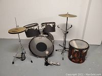 Photo showing full vintage Yamaha drum set with bass drum, toms, floor tom, cymbals, and kick pedal.