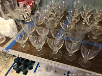 Overview of all dessert dishes and glasses arranged on a table, showing quantity and condition