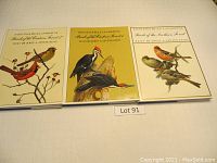 Front covers of the three books displayed: Birds of the Eastern Forest Volumes 1 and 2 and Birds of the Northern Forest. Each cover features detailed bird paintings and title text.