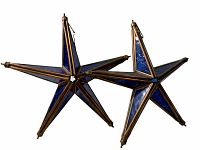 Pair of five-pointed blue glass stars with bronze metal frames side by side, showing front and back angles