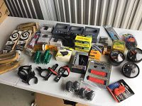 Wide overview showing all cycling accessories laid out on a table