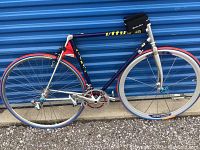 Full left side view of bicycle showing frame, fork, wheels and components