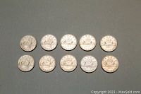 Ten 1969 Canadian dollar coins arranged in two rows of five, showing the canoe design and date.