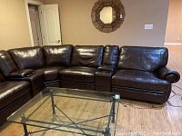 Full view of sectional modules and coffee table in basement