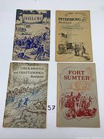 Front view of the 4 small books: Shiloh, Petersburg Battlefields, Chickamauga and Chattanooga Battlefields, Fort Sumter with illustrated covers.
