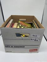 Box with books visible inside