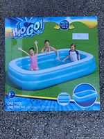 Front box image of H2O Go! inflatable rectangular pool with children playing inside, showing dimensions and branding.