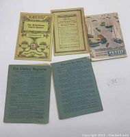 Five printed items: two vintage play pamphlets, two Library Magazine pamphlets, one fishing magazine.