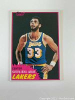 Front view of the 1981 Topps Kareem Abdul-Jabbar basketball card in Lakers uniform with clear text and bright colors.