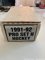 Closed cardboard box with label '1991-92 Pro Set II Hockey' on side.