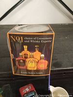 Box side showing Crown Royal bottles and "No 1 choice of Consumers and Whisky Experts" text