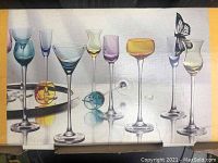 Original retail box showing all six different pastel colored stemmed liqueur glass designs, two glasses each for a total of 12 pieces.