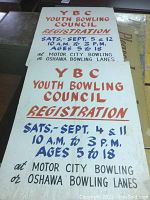 Metal signs for Youth Bowling Council registration with dates and locations.