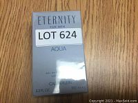 Front of the Eternity Aqua Eau de Toilette box showing brand, product name, and size.